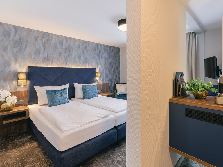 Elegantes Doppelzimmer im Hotel Rose mit moderner Einrichtung und klaren Linien